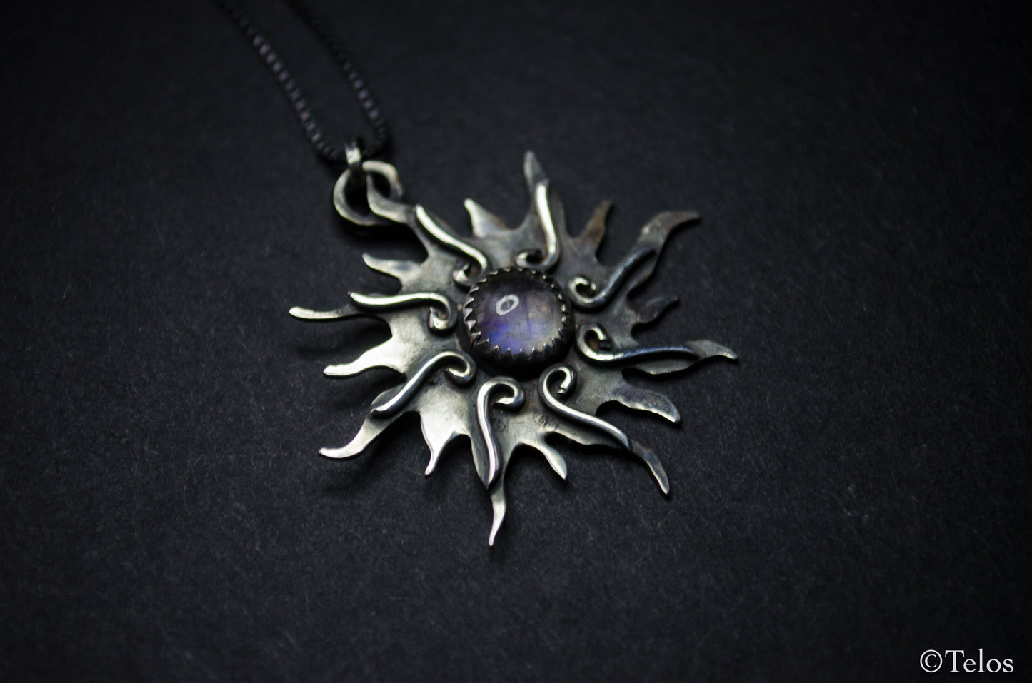 Silver sun pendant